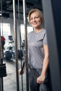 Women over 40 rebuilding confidence through personalized fitness training at Impact Fitness Solutions studio in New Jersey