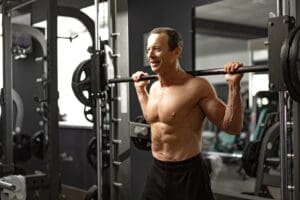 Senior man over 40 strength training at Impact Fitness Solutions gym in New Jersey to boost mood, confidence, and overall wellness