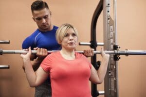 Personal trainer at Impact Fitness Solutions coaching adults over 40 on the mental and physical therapy benefits of lifting weights in New Jersey